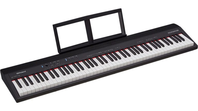 Roland GO PIANO88 angled top shot with black enclosure, keybed, and music stand