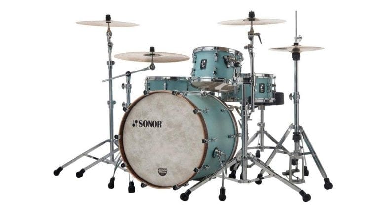Sonor SQ1 drum set full kit shot with shells, cymbals, and hardware in teal with pearloid bass drum resonant head.
