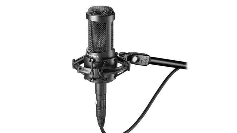 audio-technica-at2050 condenser microphone mounted in shockmount on microphone stand arm