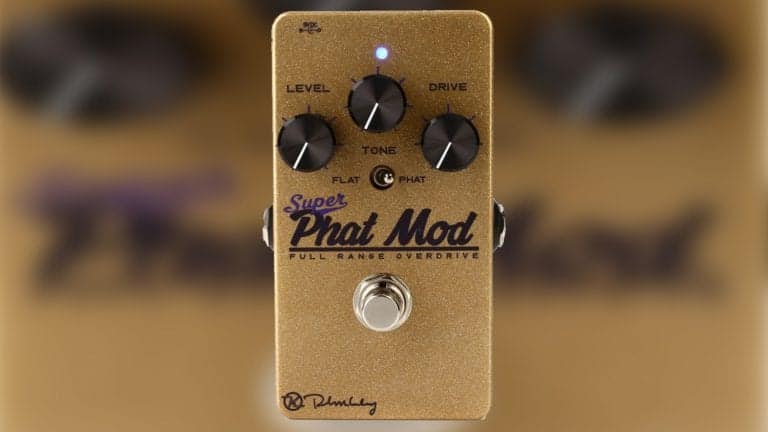 keeley super phat mod transparent overdrive pedal with gold sparkle enclosure and black control knobs