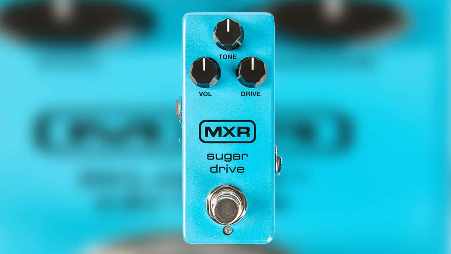 mxr sugar drive transparent overdrive pedal with blue enclosure and black control knobs