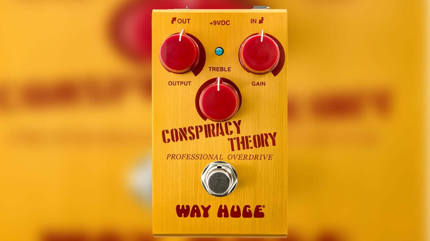 way huge conspiracy theory transparent overdrive pedal with yellow enclosure and red control knobs