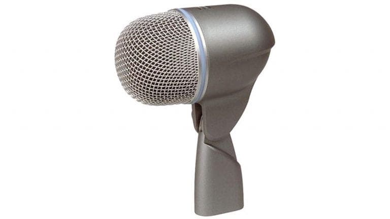 shure beta52a dynamic microphone side shot with black enclosure and grey grille