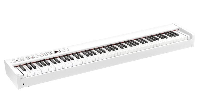 korg d1 angled front shot with white enclosure and keybed