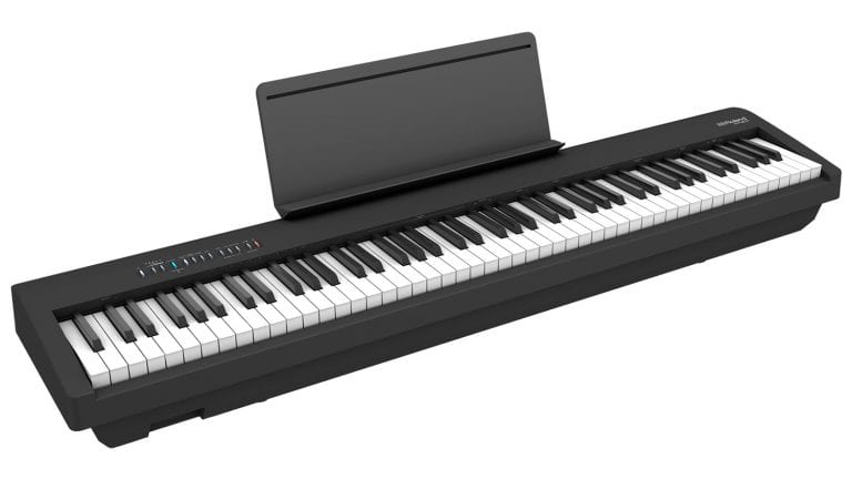 roland fp-30x angled front shot with black enclosure, keybed, and music stand