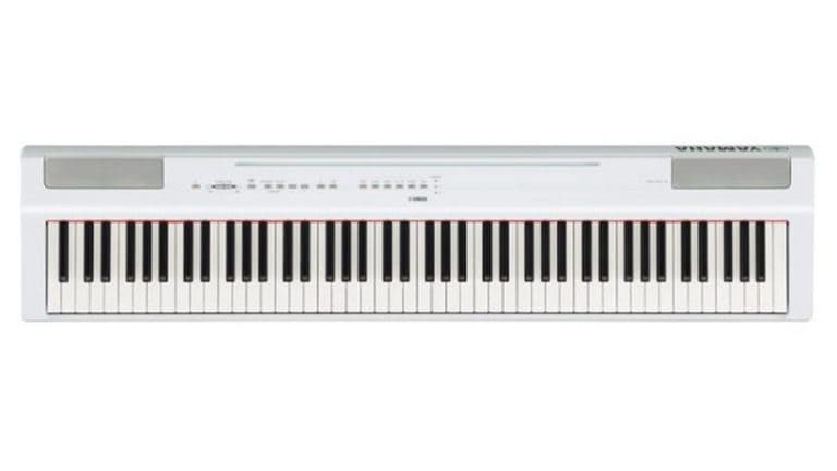 yamaha p-125 digital piano top shot with white enclosure, keybed, and controls