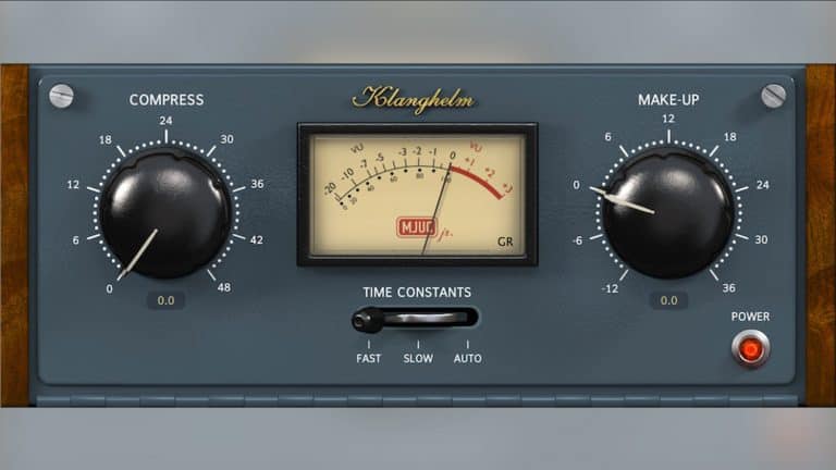 klangelm mjucjr plugin GUI with gray faceplate and faux wood side panels, controls and VU meter
