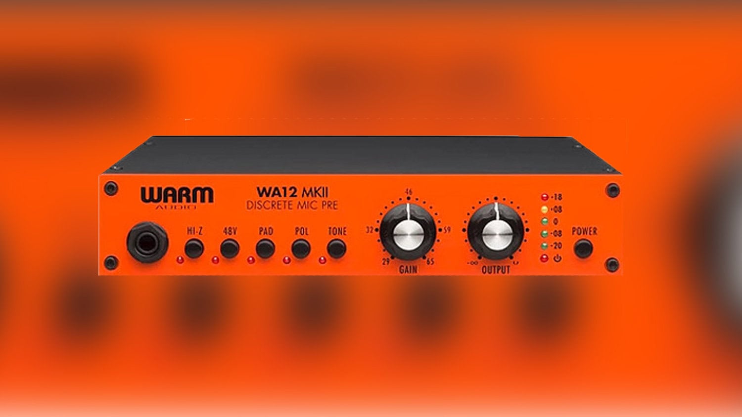 Warm Audio WA12 preamp with orange faceplate, controls, and microphone input