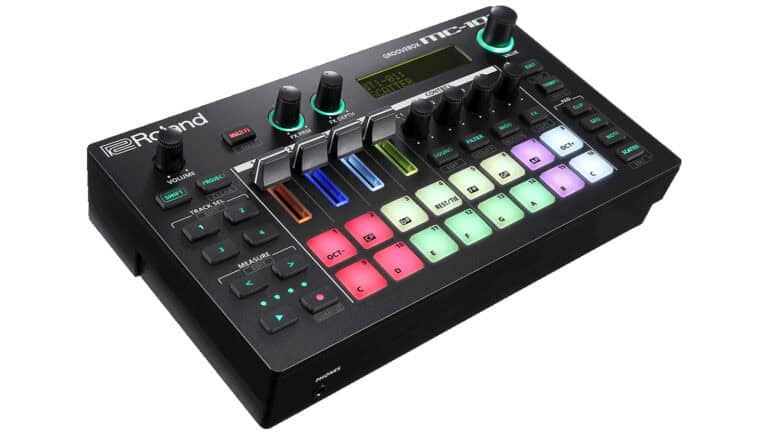 roland mc-101 beat production workstation with RGB pads, control knobs, and LCD control screen
