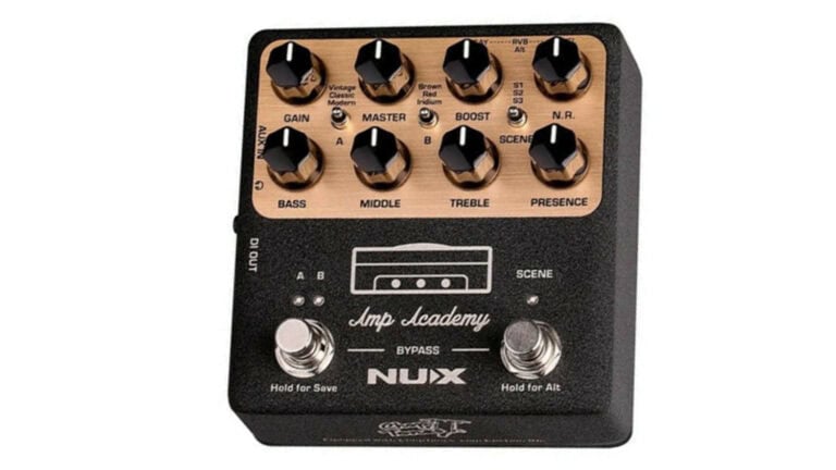 NUX Amp Academy amp modeler guitar pedal with black and gold enclosure, black control knobs, and dual footswitches