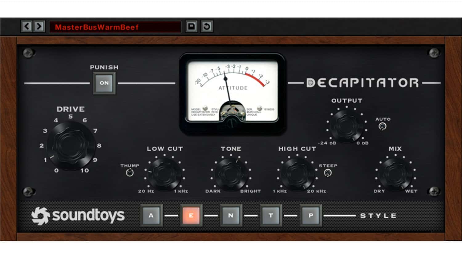 Soundtoys Decapitator plugin GUI with faceplate, wood side panels, black control knobs, and VU meter