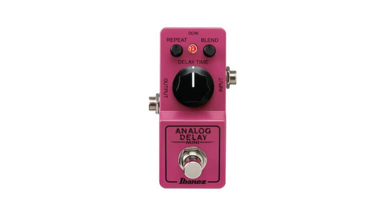 Ibanez Analog Delay Mini top shot with small pink metal enclosure, one large control knob and two smaller knobs, and LED
