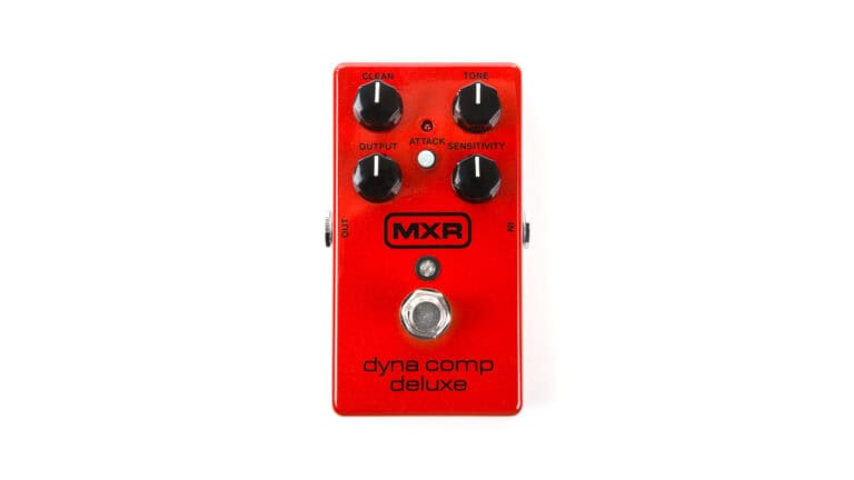 MXR M228 Dyna Comp Deluxe front shot with red enclosure, black control knobs and MXR text